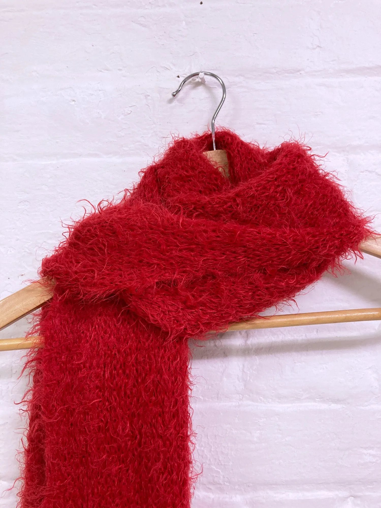 Jean Colonna red mohair-y scarf with safety pin